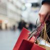 Get Big Returns on the Shopping Small Movement Closeup of woman holding shopping bags